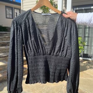 Frame black long sleeve shirt, size small, excellent condition.  No tags